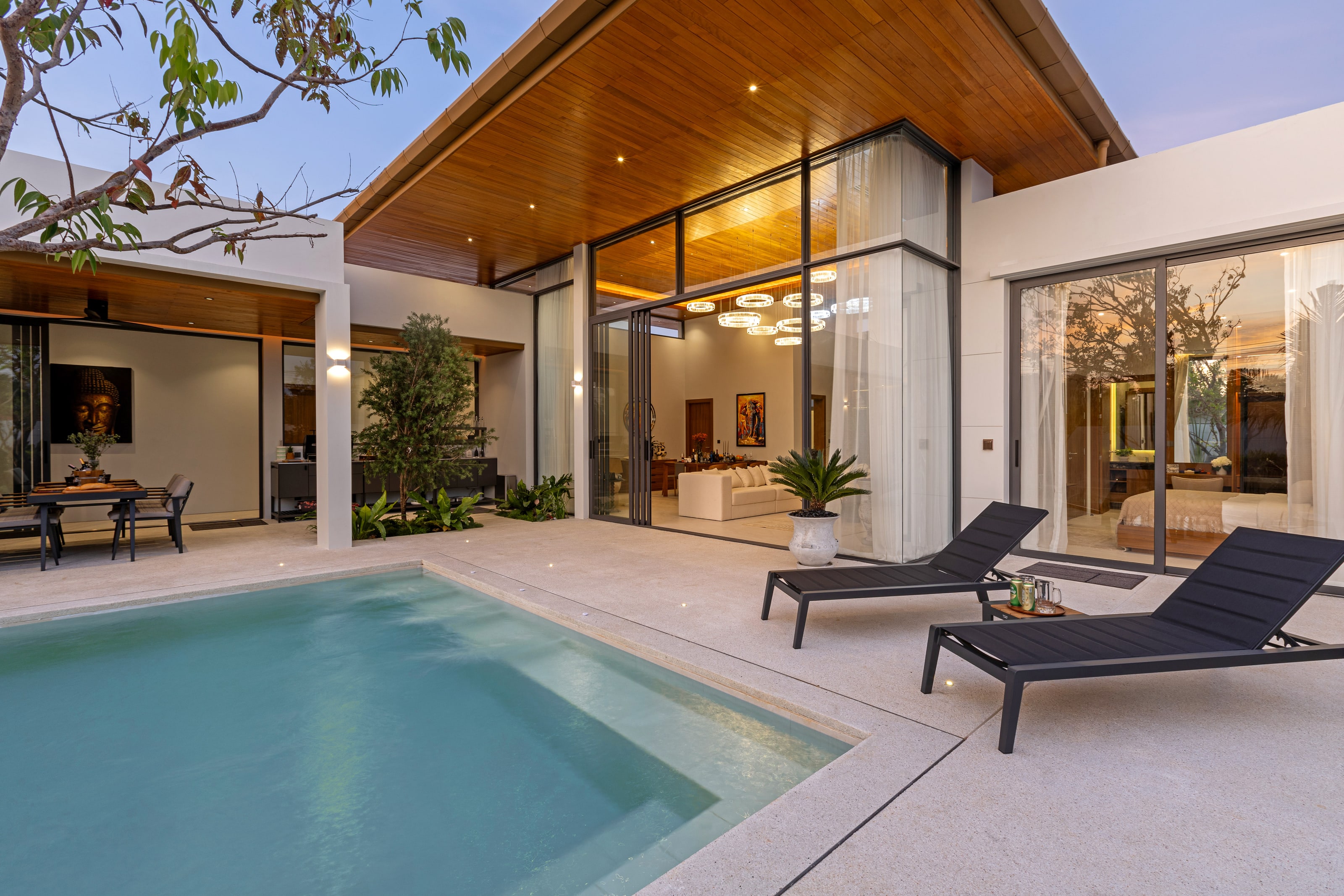 A Mouana villa pool at dusk